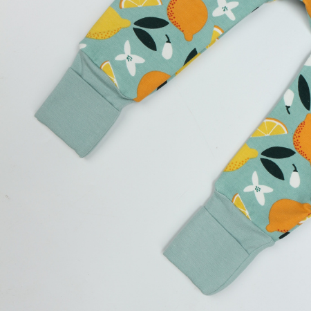 fold-over cuffs on a baby organic romper